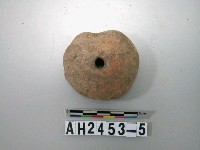 藏品(紅色素面陶紡輪)的圖片